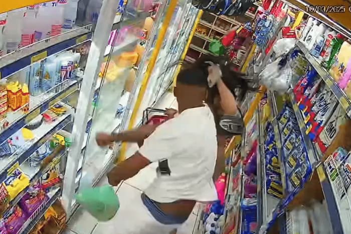 IMAGENS FORTES: Homem espanca esposa em mercado de São Paulo