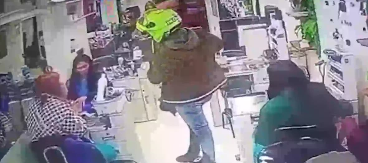 IMAGENS FORTES: Policial mata companheira em salão de beleza e em seguida tira a própria vida